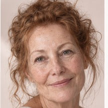 Woman using NAERVIA NAD+ firming serum