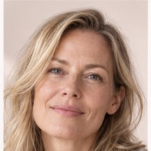 Woman using NAERVIA NAD+ firming serum