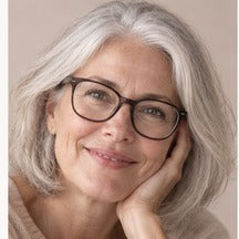 Woman using NAERVIA NAD+ firming serum